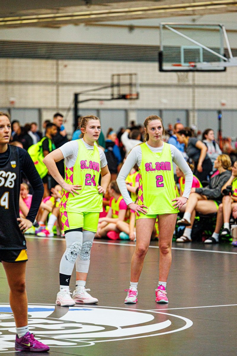 Two SLAAM players on the court between possessions.