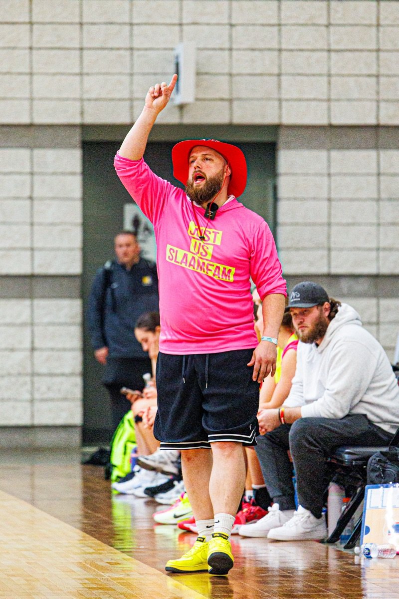 A SLAAM coach calling out an instruction during a tournament.
